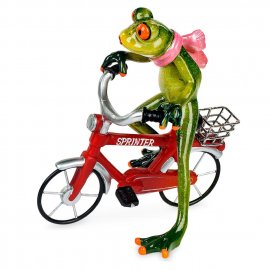 Frosch auf rotem Fahrrad