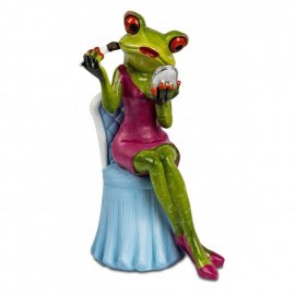 Frosch beim Schminken mit pinkem Kleid